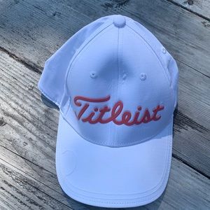 White titleist baseball cap with pink lettering